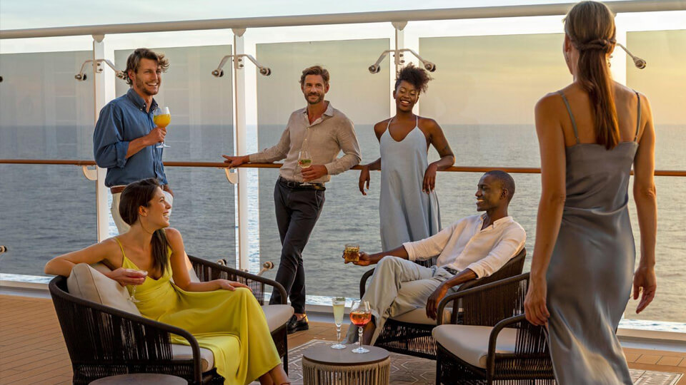 Multi-generational group socializing on cruise deck